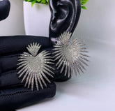 Silver Sunburst female statement dangle earrings